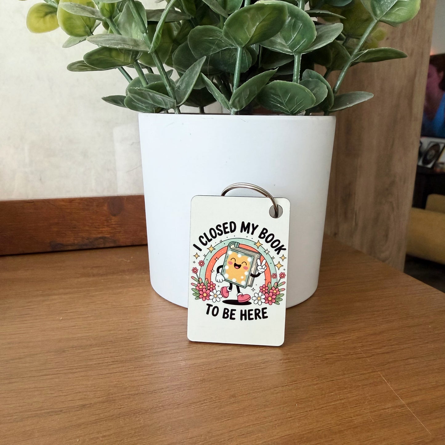 I Closed My Book To Be Here Keychain