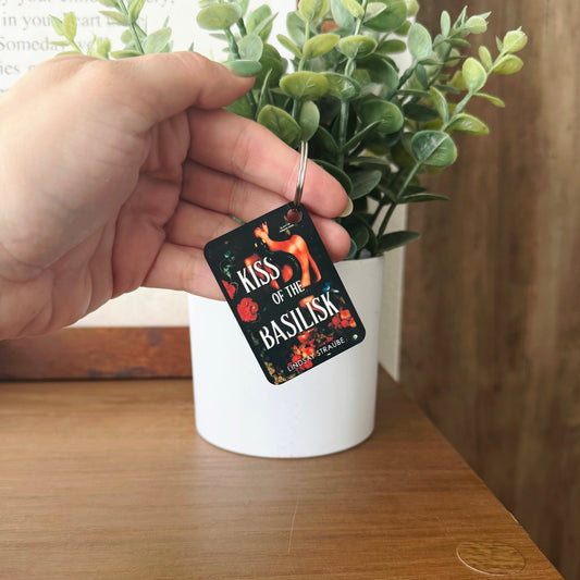 Kiss of the Basilisk Book Keychain